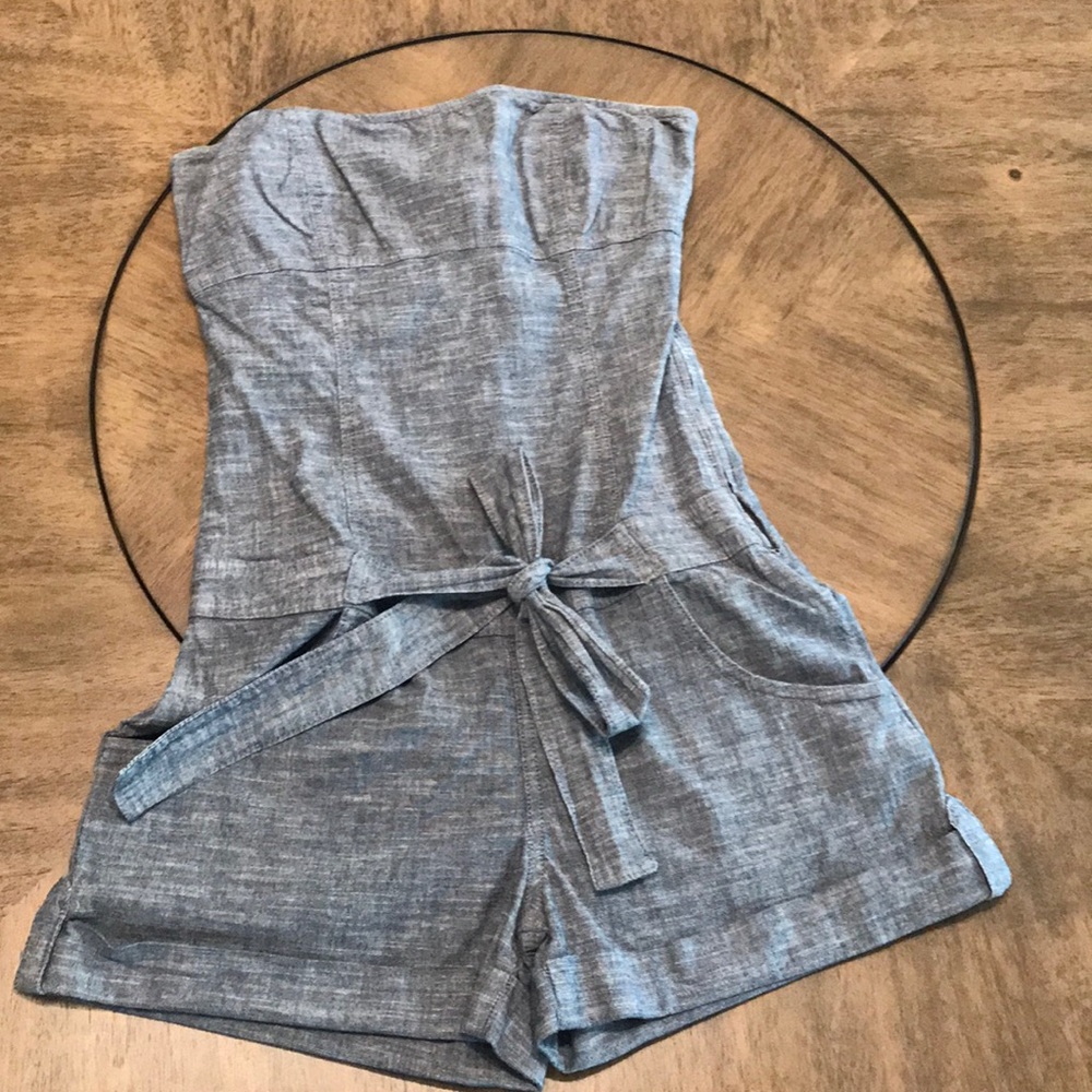 Strapless jean romper with waist tie. Size Small.